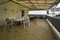 Überdachter Balkon